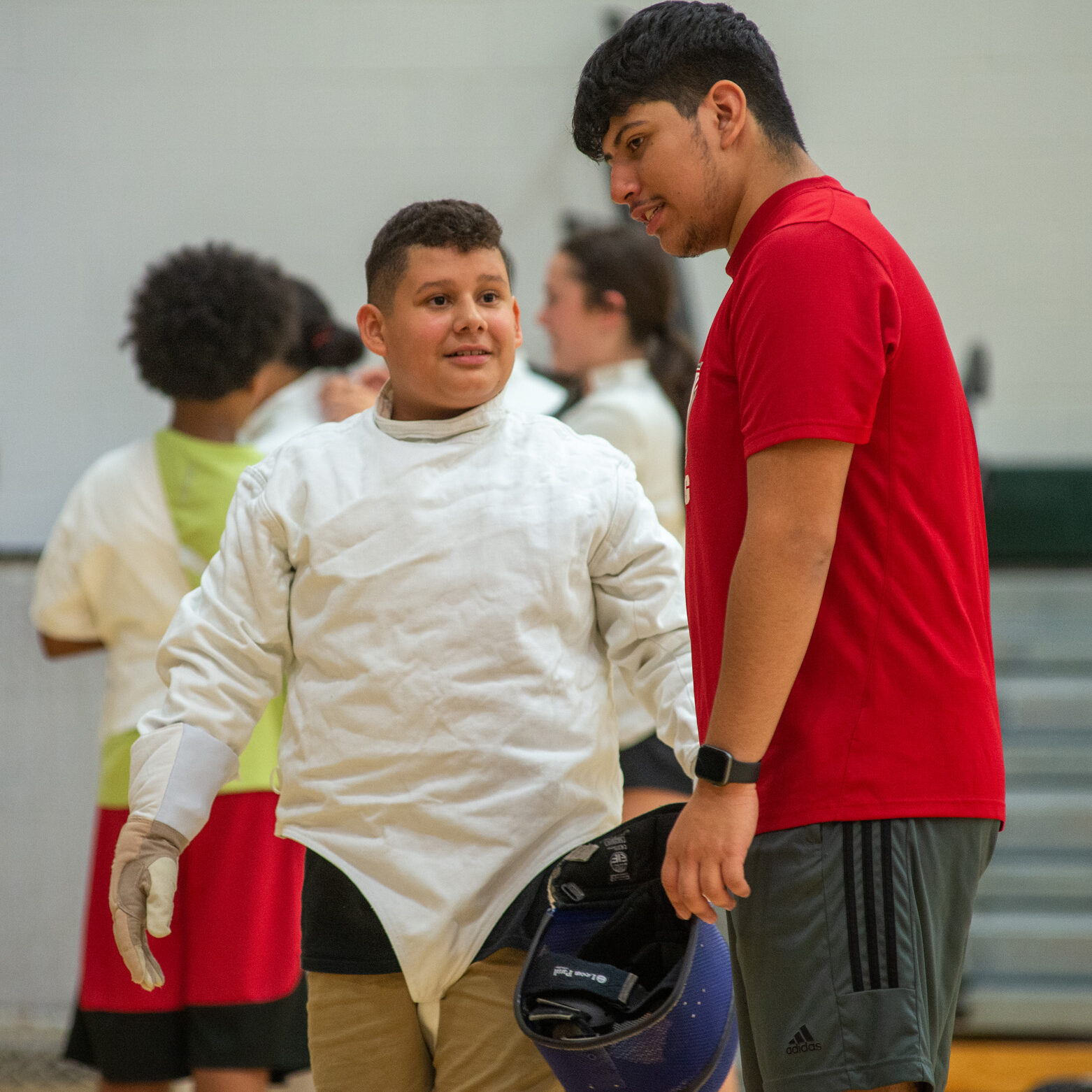 20221006_Fencing (564) Sacred Heart University’s NCAA Division I fencing team has embarked on a collaboration with The Willie and Sandra McBride Foundation, which has started a fencing program for middle school students in Bridgeport. The team worked with children at the Fairchild Wheeler Interdistrict Magnet School during a recent training session. Sacred Heart University photo by Tracy Deer-Mirek 10/6/22